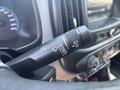 Control lever for windshield wipers in a 2017 Chevrolet Colorado with labels for different settings