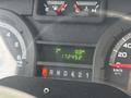Dashboard display of a 2018 Ford Econoline showing trip distance as 0.0 km and total mileage as 172452 km with RPM and speedometer gauges visible
