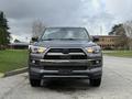 A 2021 Toyota 4Runner is parked facing forward showcasing its front grille headlights and bumper design