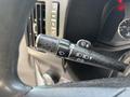 Close-up of the control stalk inside a 2020 Chevrolet Express used for adjusting windshield wipers and turn signals