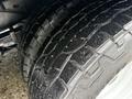 Close-up view of the tires on a 2017 Ford E450 showcasing the tread pattern and rubber detail