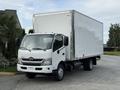 A 2020 Hino 195 box truck in white with a large cargo area and a distinctive front grille design