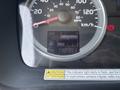 Dashboard of a 2012 Hino 338 displaying speedometer fuel gauge and odometer reading of 148983 miles