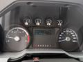Dashboard display of a 2016 Ford F-550 Super Duty showing RPM gauge speedometer fuel gauge and digital trip information
