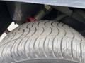 A close-up view of a tire from a 2019 Madvac LS175 showcasing its tread pattern and sidewall