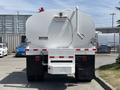 A 2015 Ford F-750 water truck with a large white tank and hose attached at the rear displaying a warning that the water is non-potable