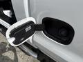 A 2019 Chevrolet Silverado 1500 with its fuel door open revealing the fuel filler neck and cap