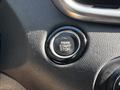 Close-up of an engine start-stop button in a 2017 Kia Sorento interior