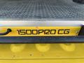A yellow truck step with the text 1500P20 CG printed in black on a metallic surface