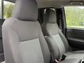 Front seats of a 2012 GMC Canyon with gray fabric upholstery and textured centers