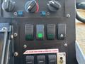 Close-up of control panel switches and knobs on a 2008 Workhorse W62 featuring green indicator lights and labeled buttons for strobe and horn functions