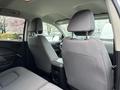 Interior view of a 2018 Chevrolet Colorado showing two front seats with headrests and a center console between them