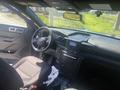 Interior of a 2020 Ford Explorer showing the driver's seat dashboard and center console with controls and display
