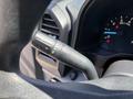 Close-up of the turn signal and headlight control lever found in a 2019 Ford F-150