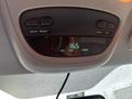 Dashboard display of a 2006 Dodge Ram 2500 showing an average fuel economy reading of 16.5 liters per 100 kilometers