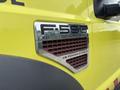 A close-up of a 2010 Ford F-550 Super Duty badge displaying F-550 XL Super Duty and V8 Power Stroke details