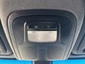 Interior view of a ceiling console with control buttons and a light fixture in a 2021 Mercedes-Benz Sprinter 2500