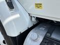 A 2012 International 7300 Workstar diesel fuel tank with a caution label indicating diesel fuel only