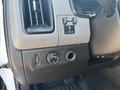 Interior dashboard controls and knobs of a 2017 Chevrolet Colorado including air vent headlight switch and ignition area