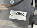 A metal identification plate on a 2011 International 4300 featuring the Altec logo and details including part number and serial number