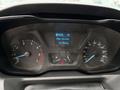 Instrument cluster of a 2018 Ford Transit displaying speedometer fuel gauge and odometer reading of 147384 kilometers