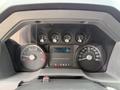 Dashboard display of a 2019 Ford F-750 showing speedometer tachometer and various gauges for trip information and fuel level
