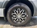 A close-up view of a silver 2019 Mercedes-Benz Sprinter wheel featuring a shiny multi-spoke alloy rim and a treaded Continental tire