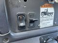Dashboard controls of a 2007 Freightliner M2 106 including switches for mirror heat and engine brake