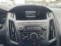 Dashboard of a 2018 Ford Focus featuring a central display screen and control buttons for audio and navigation functions