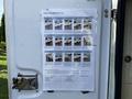 A laminated instruction sheet titled "Prepare Your Body Warm it up" attached to the door of a 2006 International 7500 truck displaying several images demonstrating warm-up exercises