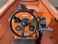 A 2007 Fassmer 20 Foot Fast Rescue Boat featuring an orange dashboard with a steering wheel gauges and controls for navigation and safety equipment