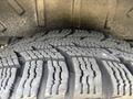 Close-up of a tire with detailed tread pattern from a 2016 Ford Transit 150