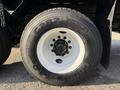 Close-up of a white wheel and tire labeled G282 MSD Goodyear on a 2011 International 7500 vehicle