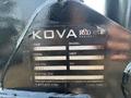 2009 Ford F-450 Super Duty with a black body and a KOVA engineering label attached to it