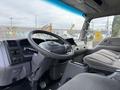 Interior view of a 2008 International CityStar truck showing steering wheel dashboard and seats