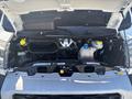 The image shows the engine compartment of a 2020 RAM ProMaster 3500 with various engine components visible including the coolant reservoir and air intake system