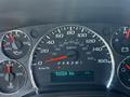 Dashboard of a 2017 Chevrolet Express showing speedometer fuel gauge and odometer indicating 153324 Km