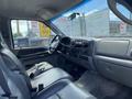 Interior view of a 2007 Ford F-350 SD showing the driver's seat dashboard and steering wheel