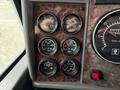 Dashboard of a 2008 Kenworth T370 showing various gauges including speedometer fuel water temperature and oil pressure