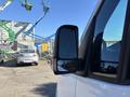 A 2021 Mercedes-Benz Sprinter 2500 side mirror showcasing a sleek design with a chrome accent and clear reflective surface