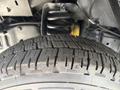 Close-up of a tire tread on a 2018 Ford Econoline showing the pattern and depth of the tire grooves