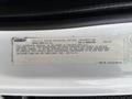 A 2015 Freightliner M2 vehicle noise emission control information label detailing compliance with U S regulations for medium and heavy trucks