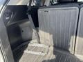 Interior of a 2018 Toyota Highlander with a flat cargo area and rubber mat visible
