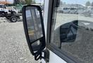 Close-up of the side mirror on a 2017 Grande West Vicinity bus showing its sleek design and reflective surface