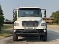 A white 2016 Freightliner M2 106 truck facing forward with a chrome grille and two side-view mirrors