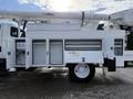 A white 2011 International 4300 bucket truck with an Altec boom and multiple storage compartments on the side