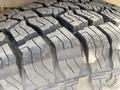 Close-up of a rugged tire tread from a 2025 Mercedes-Benz Sprinter showcasing deep grooves for traction