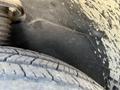 Close-up of a tire from a 2022 Mercedes-Benz Sprinter showing tread depth and texture