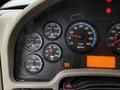 Dashboard of a 2012 International 7400 showing various gauges including engine oil temperature water temperature and RPM displays
