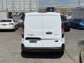 A white 2021 Ford Transit Connect van viewed from the rear with a simple design and a black handle on the back door